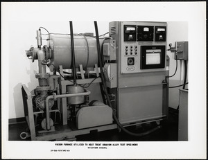 Vacuum furnace utilized to heat treat uranium alloy test specimens