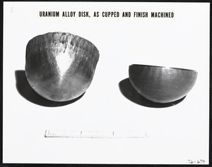 Uranium alloy disk, as cupped and finish machined