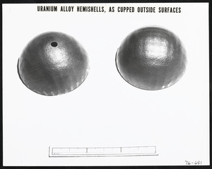 Uranium alloy hemishells, as cupped outside surfaces