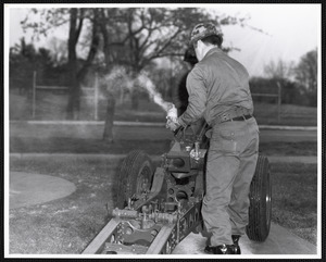 Military officer loading cannon