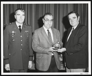 Officer Sibert and men with award