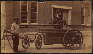 Old hand pump fire engine