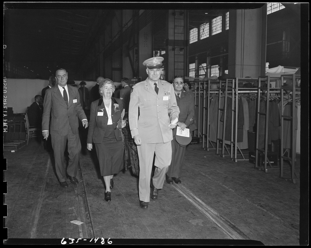 Col. Mesick walking with Edith Nourse Rogers and group