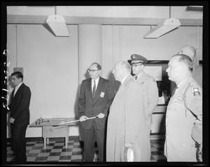 Men and officers touring facilities
