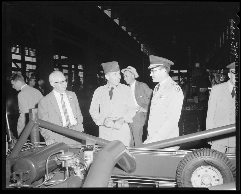 Men and officers touring facilities