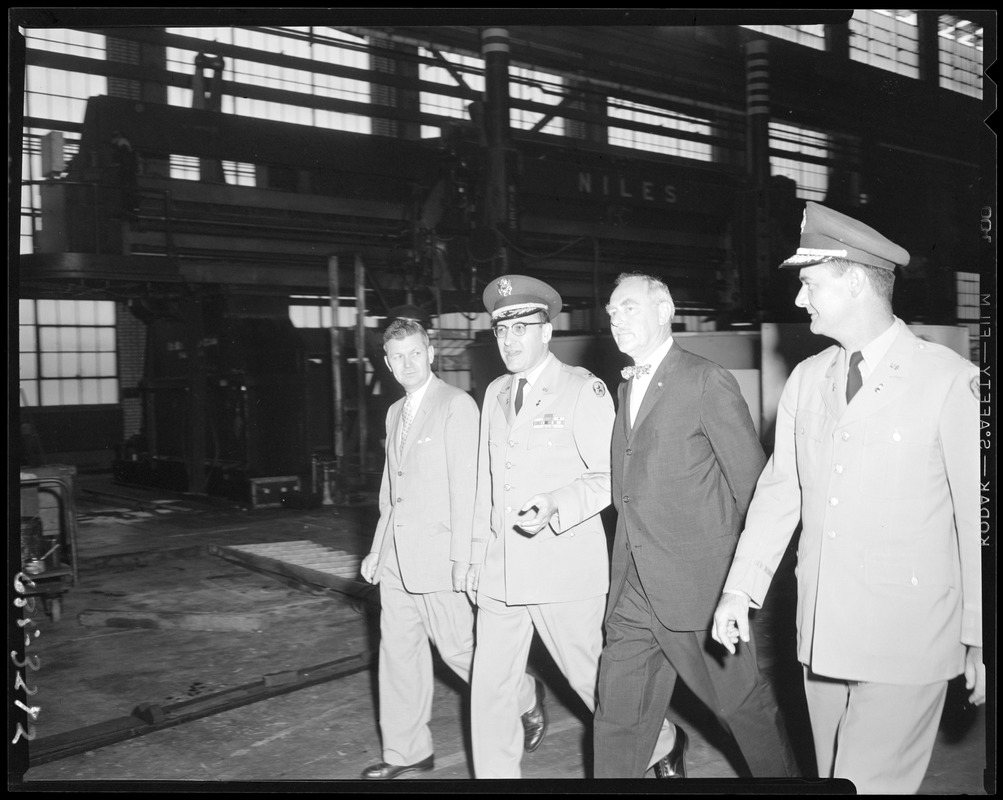 Men and officers touring facilities