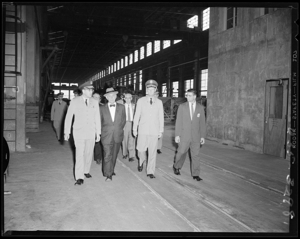 Men and officers touring facilities