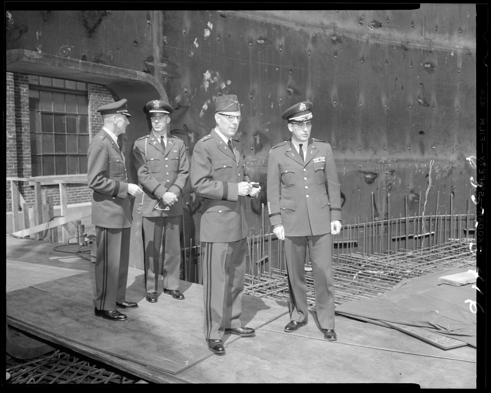 Military officers standing on ramp