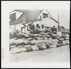 Residents of Sea Bright, N.J., sandbag their homes as rough seas and high tides batter waterfront. Whole eastern seaboard is readying for any move Hurricane Connie may make.