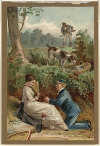Young couple with hunter in the background