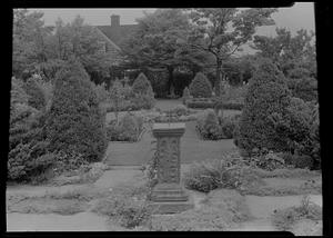 Looking east across center of Mrs. W. H. Cary's garden, old sundial (1640) in foreground