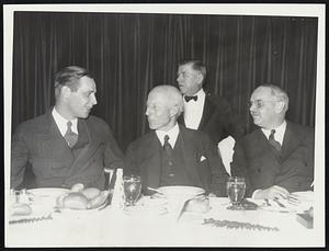 Mayor Tobin, Charles Francis Adams and General Chairman Stuart C. Rand, left to right, at the final dinner of the Greater Boston Community Fund campaign at the Hotel Statler last night.