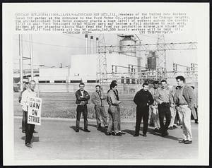 Chicago Out – Chicago Heights, Ill.: Members of the United Auto Workers Local 588 gather at the entrance to the Ford Motor Co., stamping plant in Chicago Heights. The strike troubled Ford Motor company starts a huge layoff of workers across the country 11/13 in what Ford President Arjay Miller says may become a full shutdown by next week. Strikes at key stamping plants that feed the Ford car production scheme, are blamed for the layoff. If Ford closes all its 90 plants, 160,000 hourly workers will be laid off.