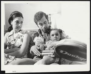 Press Conference...Logan Airport... Tennis Star Ismail el Shafei and wife Noucha and daughter Dina, 15 mos.