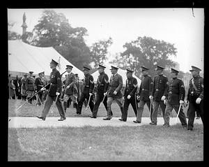 A group of men in military uniform walking together