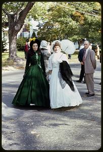 Two women dressed in period costume during the bicentennial parade