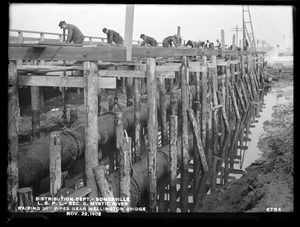 Distribution Department, Low Service Pipe Lines, Section 5, Mystic River, raising 36-inch pipes near Wellington Bridge, Somerville, Mass., Nov. 22, 1902