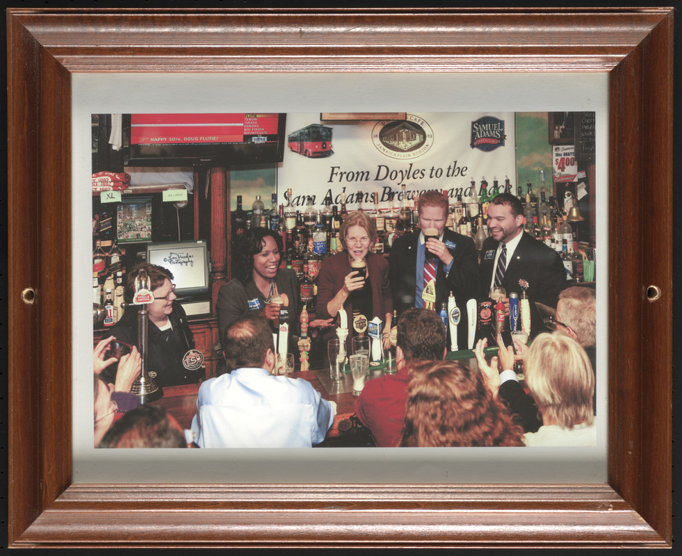 Elizabeth Warren behind bar at Doyle's Cafe