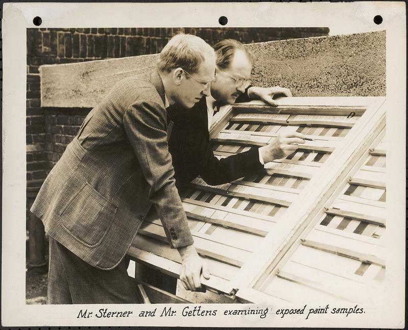 Mr. Sterner and Mr. Gettens examining exposed paint samples