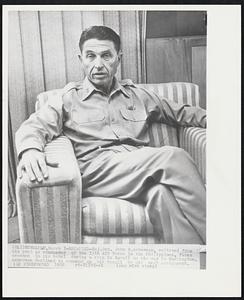 Recalled - . John B. Ackerman, relieved from his post as commander of the 13th Air Force in the Philippines, faces newsmen in his hotel during a stop in Hawaii on his way to Washington. Ackerman declined to comment on his recall or his next assignment.