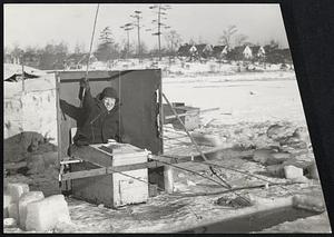 The icy winds by makeshift shelter, had to dig through a 10-inch smelt dangling on the hook. Our