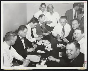 Counting Vote by which striking Eastern Massachusetts Street Railway bus drivers decided to continue the walkout, local presidents met in Hotel Manger yesterday. Extreme left, Norman Branden of Lynn, conference chairman.