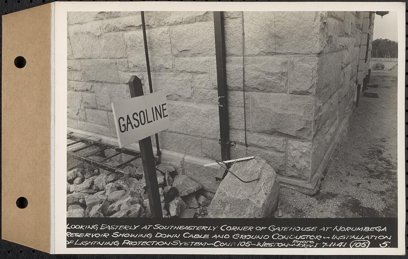 Contract No. 105, Lightning Protection for Buildings, Barre, Belchertown, Hardwick, Marlborough, Rutland, Southborough, Weston, West Boylston, looking easterly at southeasterly corner of gatehouse at Norumbega Reservoir showing down cable and ground conductor, Weston, Mass., Jul. 11, 1941