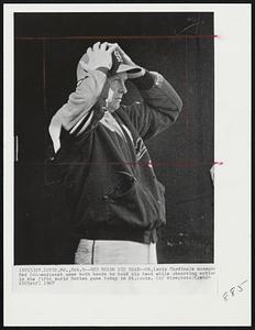 Red Holds His Head -- St. Louis Cardinals manager Red Schoendienst uses both hands to hold his head while observing action in the fifth World Series game today in St.Louis.