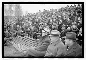 Boston Parks Department Commissioner William Long watching a football game, Back Bay Fens