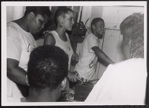 Young people serving food