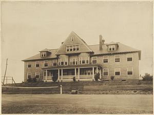 View of building and tennis court, Long Island, Boston Harbor