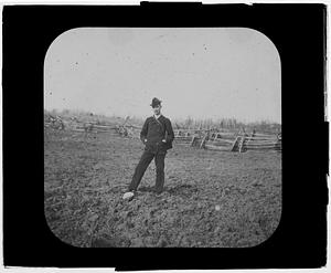 Portrait of man posing in field