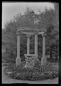 Old marble well-top in rose garden of Mrs. L. A. Frothingham
