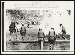 Push Back Demonstrators -- Demonstrators disperse on the University of Maryland campus tonight after state police threw tear gas into the crowd.