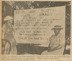 Mrs. Arthur P. Dana (l.) and Mrs. William S. Sanborn (r.) at Library Association membership booth, street fair, South Yarmouth, Mass.