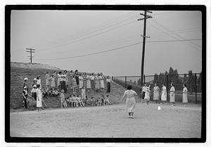 Women playing baseball