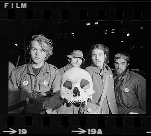 Anti-war demonstrators with human skull, Government Center