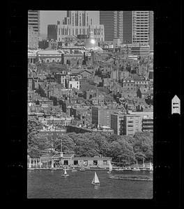 Sailboats on Charles River Basin with Beacon Hill in background, downtown Boston