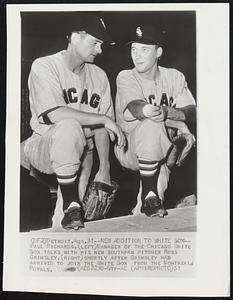 New Addition to White Sox-- Paul Richards, (left) Manager of the Chicago White Sox talks with his new southpaw pitcher Ross Grimsley, (right) shortly after Grimsley had arrived to join the White Sox from the Montreal Royals.