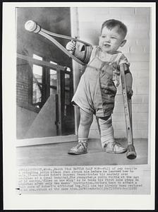 A Battle Half Won--Full of pep despite a crippling polio attack that struck him before he learned how to walk, 18-month-old Robert Dusseau demonstrates his mastery over crutches at a local hospital. The youngster, a polio victim at the age of 12 months, 'flies on one wing' as he takes his first solo steps on crutches after only two weeks' instruction. Doctors hope to effect a full cure of Robert's afflicted leg. Full use has already been restored to an arm, struck at the same time.