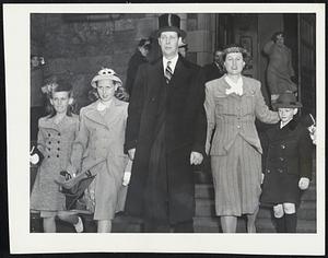 Governor and family attend Easter services at the Cathedral of the Holy Cross. Left to right, Carol Ann, 10; Helen Louise, 11; Gov. Tobin, Mrs. Tobin and Maurice, 7.