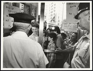 David Stoppelman enters the Federal BLDG to give himself up to the marshal