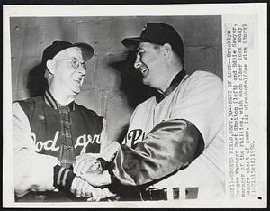 Best of Luck--Brooklyn Dodger Manager Burt Shotton (left) and Eddie Sawyer, manager of the Phillies, wish each other luck today before start of game.