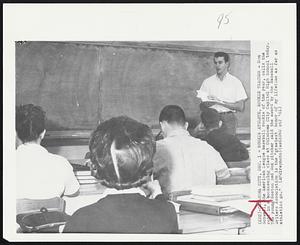 Rookie Athlete, Rookie Teacher - Don Schwall, the American League baseball rookie of the year, calls the roll in a bookkeeping class at Oklahoma City Capitol High School today. The young Boston Red Sox pitcher said the award by the Baseball Writers Association is the "greatest honor of my lifetime as far as athletics go."