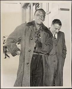 Arrives at Logan International Airport, David Booker, arrives via American Airlines from New York