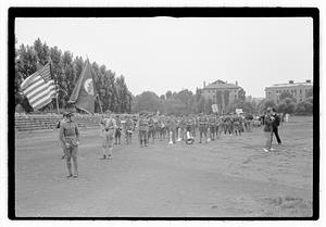A marching band leading a group