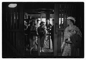 Passengers getting on a ship