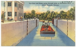 Tow boat and barge going through locks on Savannah River, below Augusta, Georgia