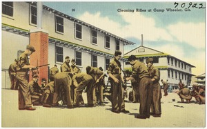 Cleaning rifles at Camp Wheeler, Ga.