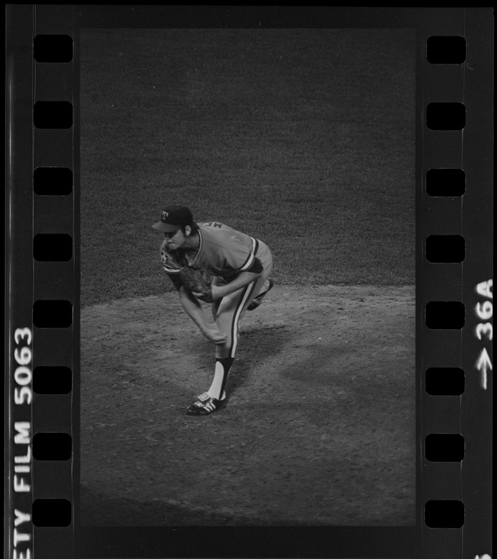 Texas Rangers pitcher Doc Medich (#42) completes his delivery of a pitch in a game against the Boston Red Sox at Fenway Park